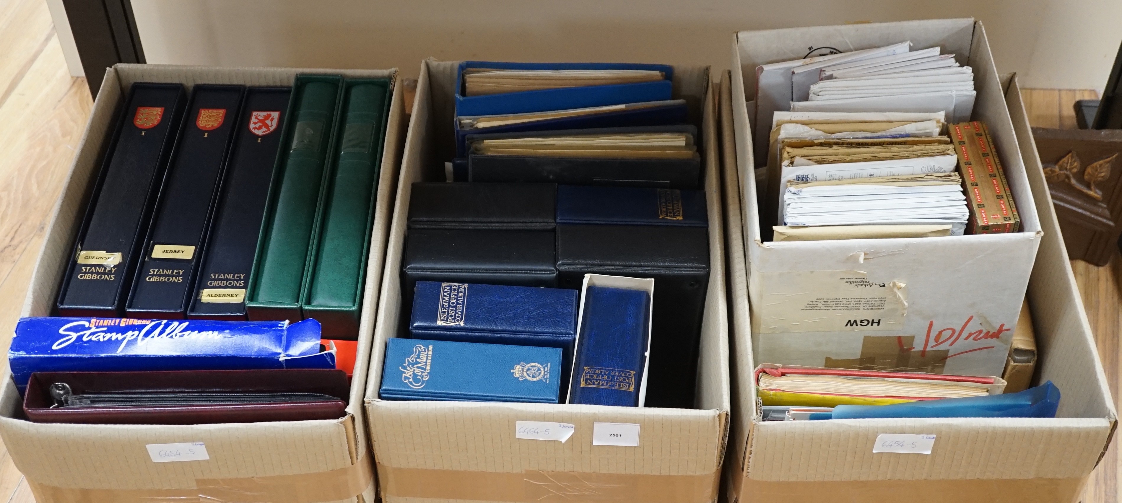 Three boxes of stamps in albums, GB Channel Islands, Isle of Man, mint stamps and FDC’s